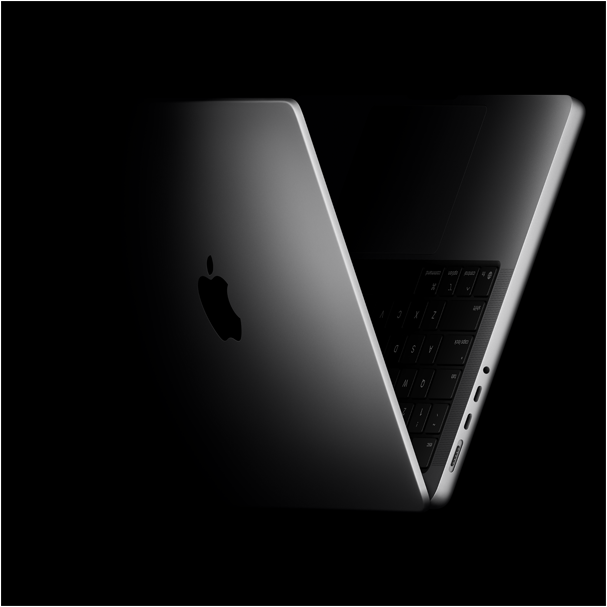 MacBook Pro yang diposisikan dalam bentuk V, mengacu ke chip M5