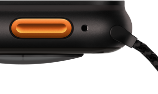 Apple Watch Ultra 3, warna hitam, casing titanium, sensor konveks di bagian belakang, eksterior sisi kiri, tombol Tindakan, sirene